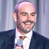 <b>Billy Mitchell</b><br>Executive Editor<br><em>Scoop News Group</em>